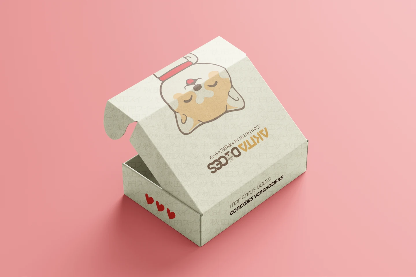 Embalagem criada pela iellou sobre fundo rosa, com ilustração, logotipo e mensagens aplicadas à caixa.